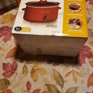 Slow cooker with removable stoneware.  Cooks a meal for 4+ people.  Dishwasher s